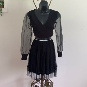 Black lined sheer pleated skirt.  Great for Madonna Concert
